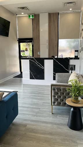 Patient lounge with marble reception desk