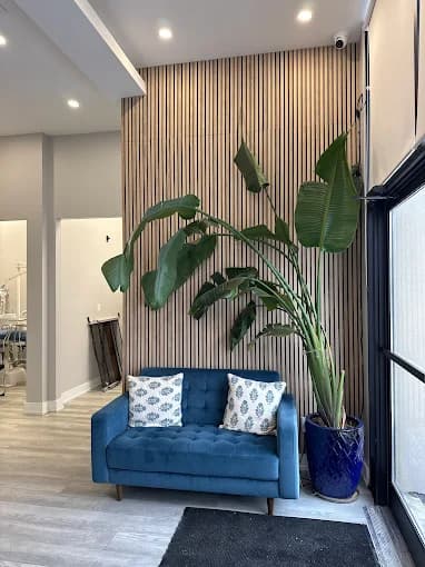 Lounge seating with a wood-slat accent wall